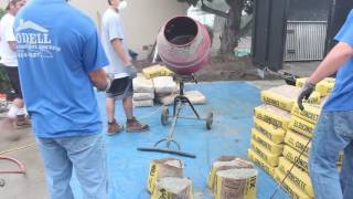 How to mix concrete in a mixer [upl. by Atinauq]