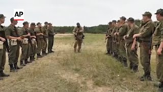 Belarus says Wagner fighters training its troops [upl. by Suehtomit909]