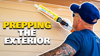 Painting a house ALONE Caulking The Exterior [upl. by Osrit]